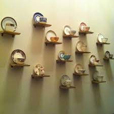 Decorative standing metal tea cup and saucer display, holds 6 tea cup and saucers, table top display. Popsugar Tea Display Tea Cup Display Tea Cup Collection