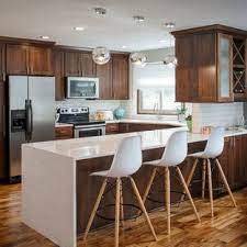 A beautiful example of a subway tile kitchen backsplash in white. 75 Beautiful Kitchen With Brown Cabinets And Subway Tile Backsplash Pictures Ideas April 2021 Houzz
