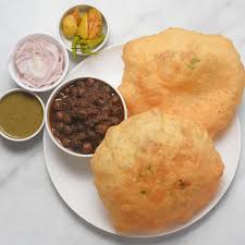 Drop the rolled dough into the hot oil. Radhey Shyam Subhash Kumar Special Chole Bhature Home Delivery Order Online Paharganj Karol Bagh Delhi