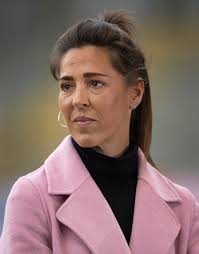 Who is Fara Williams and when did she retire from football?