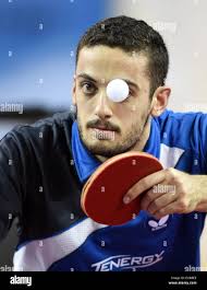Doha, Qatar. 21st Feb, 2015. Portugal's Marcos Freitas serves the ball  during the men's singles quarterfinal against Austria's Daniel Habesohn at  the GAC Group 2015 ITTF World Tour, Qatar Open (Super), in