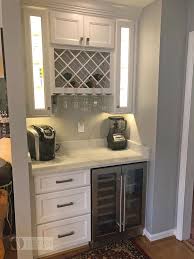 This Kitchen Design In Bowie Md Achieved A Striking Style With Two Toned Kitchen Cabinets By In In 2020 Glass Kitchen Cabinets Kitchen And Bath Design White Cabinetry