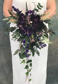 To start, select your flowers. Large Shades Of Purple Cascading Silk Bridal Bouquet Purple Etsy Purple Bridal Bouquet Purple Bouquets Purple Wedding Bouquets