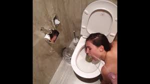 teen human toilet waiting for me to piss all over her face next to the  toilet at the hotel