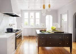The main reason white is so popular in kitchens is because it's the perfect background for any other colors you what countertops go best with white cabinets? Best Two Toned Kitchen Cabinet Ideas