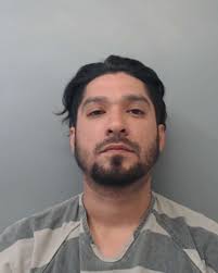 LPD: Man accused of strangling girlfriend, spitting