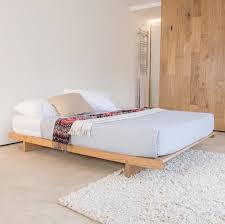 low fuji attic platform wooden bed frame by get laid beds etsy in 2021 wooden bed attic bed wooden bed frames