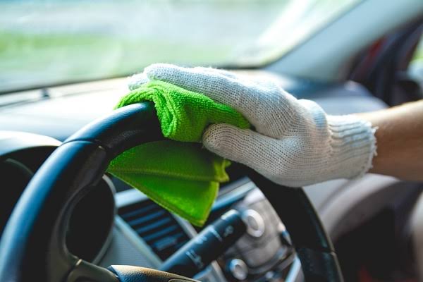 Regular wiping prevents oil and dirt buildup on your wheel., AI generated