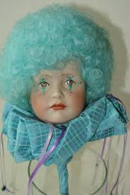 PORCELAIN HEAD CLOWN DOLL