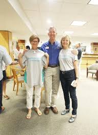 Hold Up Those New Shirts Group Photos At The First State Bank Chamber Business After Hours Key West After Hours Florida Keys