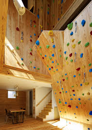To attach the pieces of the climbing wall start by marking the studs that they will attach to. Climbing Wall Home Climbing Wall Indoor Climbing Wall Diy Climbing Wall