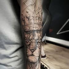A trippy maze pays homage to surrealism, and fades into an illustrative depiction of two angels mourning over a third fallen angel. Tattoo Ideas For Men Arm Lion Novocom Top