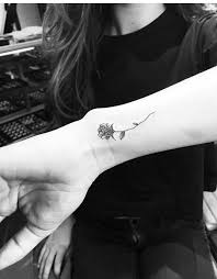 Rose has always been regarded as a symbol of love. West 4 Tattoo Rose Wrist Tattoo Rose Tattoos On Wrist Tattoos Trendy Tattoos