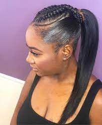 Invisible Extendo Ponytail 60 Accent Braids In The Front Then Hair Is Pull Back Into A Sleek Pon Pony Hairstyles Shaved Side Hairstyles Cornrow Hairstyles