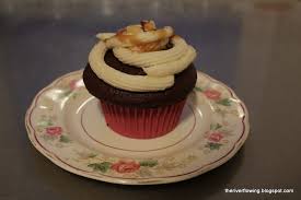 When i was 16, i started mixing flavored coffee into ice cream at a restaurant i worked at. The River Higlander Grogg Filled Cupcakes