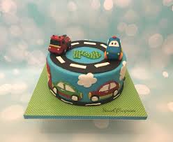 So take a few minutes and hop over to check out all of these birthday cakes for boys that you can make. Cars And Fire Truck For 2 Year Old Birthday Party Car Fire Truck Cake Modeling Chocolate T Boy Birthday Parties Cars Birthday Cake Birthday Party Food