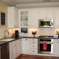 How to install subway tile kitchen backsplash part two. White Subway Tile Kitchen Ideas White Cupboards Black Counters