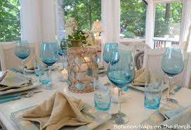 A Beach Themed Table Setting With A Starfish Napkin Fold Beach Table Settings Christmas Decorations Dinner Table Dinner Table Decor
