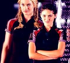 And was proven to be a fierce and formidable child and was proven to be a fierce and formidable child *cues scene where she throws a knife at the district 9 boy in the back and katniss looks at clove with fear* Glimmer And Clove Glimmer Hunger Games Clove Hunger Games Hunger Games