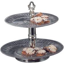 Featuring a unique, distinctive silver galvanized metal and mango wood construction, this 2 tier cupcake riser stand is an excellent way to give your dessert displays an added touch of charm and style. 2 Tier Silver Tone Polystyrene Serving Stand 13 Dia X 11 H