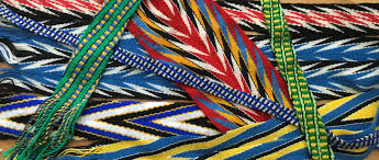 Sashes were a popular trade item manufactured in a cottage industry in the village of l'assomption, québec. Finger Weaving Jumaka