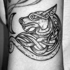 The design always consists of celtic knots intertwined within the wolf. Celtic Wolf Tattoos History Meanings Designs