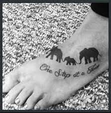 15 Elephant Tattoos To Get You Inspired Elephant Tattoos Elephant Family Tattoo Family Tattoos