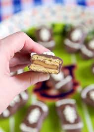 Nutter butter truffles are made from cookie crumbs, cream cheese, and peanut butter. Rolo Stuffed Nutter Butters Football Friday Plain Chicken