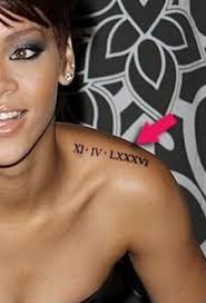 Rihanna's cross tattoo has sparked some fierce public outrage by critics who claim the slanted cross tattoo the singer is now sporting symbolizes godlessness and ties to the illuminati. Melahippie S Image Shoulder Tattoo Roman Numeral Wrist Tattoo Roman Numeral Tattoos