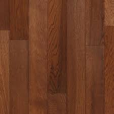 It has been finished as sanded, stained, and coated with polyurethane in the factory. Style Selections Prefinished Gunstock Oak Smooth Traditional Engineered Hardwood Flooring Sample In The Hardwood Samples Department At Lowes Com