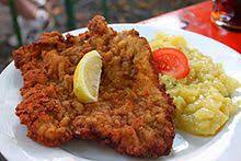 Schnitzel is a traditional german dish where meat is pounded out thin, breaded, and fried. Schnitzel Wikipedia