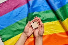 In use since the 1990s, the term is an adaptation of the initialism lgb. Female Hand Holding Small Wooden House Over Rainbow Gay Pride Lgbt Flag Creative Commons Bilder