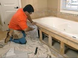 Imperial brite white matte 4×8 ceramic tile from the tile shop. Claw Foot Tub Installation Surround Demolition How Tos Diy
