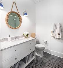 The toy sharks add some beach bathroom feel. 19 Nautical Bathrooms For Inspiration