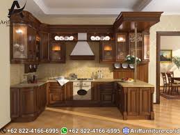 Kitchen set yang terbuat dari bahan kayu jati tentu akan memberikan kesan elegan dan juga mewah pada ruang dapur anda. Kitchen Set Kayu Jati Jepara American Design Arif Furniture Indonesia