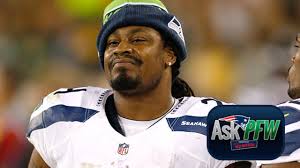 The seattle seahawks running back took the field ahead of week 17's game against san francisco with a message on his cleats that read: Ask Pfw Garoppolo Blount And Beast Mode