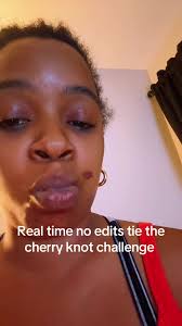 Nanny Tying A Cherry Knot with Yarn