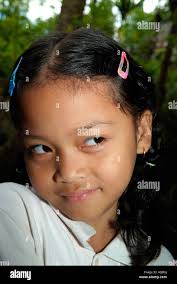 Young indonesian girl posing , North Sulawesi Stock Photo