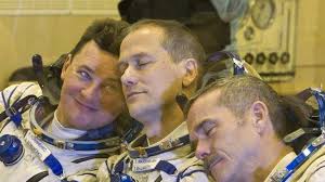 Russian rocket ferrying three to International Space Station