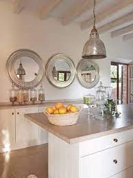 One interesting design choice is the mirror above the sink. Weekend Room Refresh 7 Kitchens Made Better With A Mirror Idee Deco Cuisine Idee Deco Cuisine Minimaliste