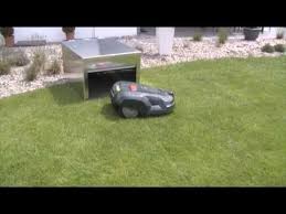 Die Erste Diebstahlsichere Mahroboter Rolltor Garage Inkl Video Prasentation Rolltor Rasenroboter Rasenroboter Garage