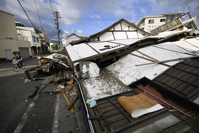 At least 13 killed in major Japan earthquake as rescuers 'race against  time' to find survivors | The Independent