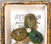 This charming antique Egyptian Revival scarab brooch is ...