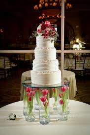 Tony foss flowers has been proudly serving oklahoma city. Love The Illusion Of The Wedding Cake Floating Floral By Tony Foss Flowers Http Www Tonyfossflowers Com Photo By L Wedding Cakes Wedding Wedding Flowers