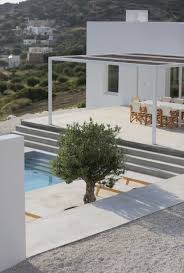 React Architects Inserts Maison Kamari Into The Arid Greek Landscape Architecture Summer House Architect Design