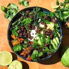 A Burrito Bowl Of Sorts With Quinoa Spiced Ground Beef Sauteed Peppers And Kale Black Beans And Avocado Stuffed Peppers Beef Burrito Bowl