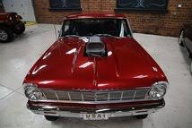 Image result for Regal Red 1965 Chevy II