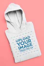 Placeit Mockup Of A Folded Pullover Hoodie Against A Flat Surface In 2020 Clothing Mockup Hoodie Mockup Hoodies