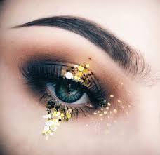 Black And Yellow Eyeshadow Looks Black Yellow Glitter Eye Makeup Eye Makeup Magical Makeup Rave Makeup