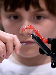 Learning to tie the cinder worm fly at Kettle Pond workshop.